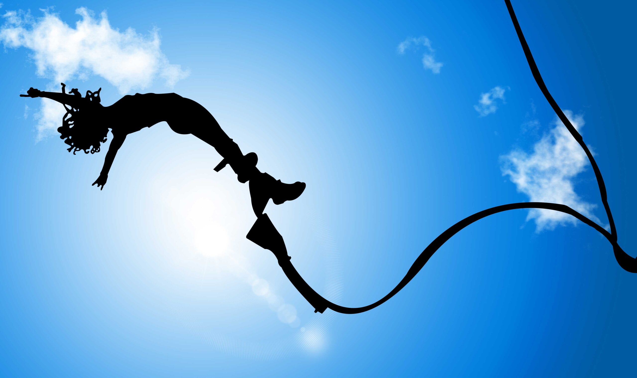 woman jumping from a bungee cord